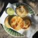 This image shows an Arepa Reina Pepiada made with chicken and avocado